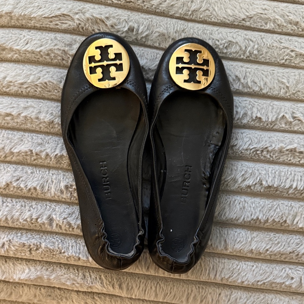 Tory Burch Black Flats with Gold Emblem